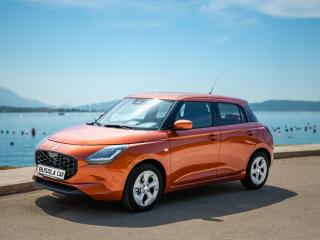 Orange Suzuki Swift 1.1 Petrol – Busola Rent a Car Herceg Novi